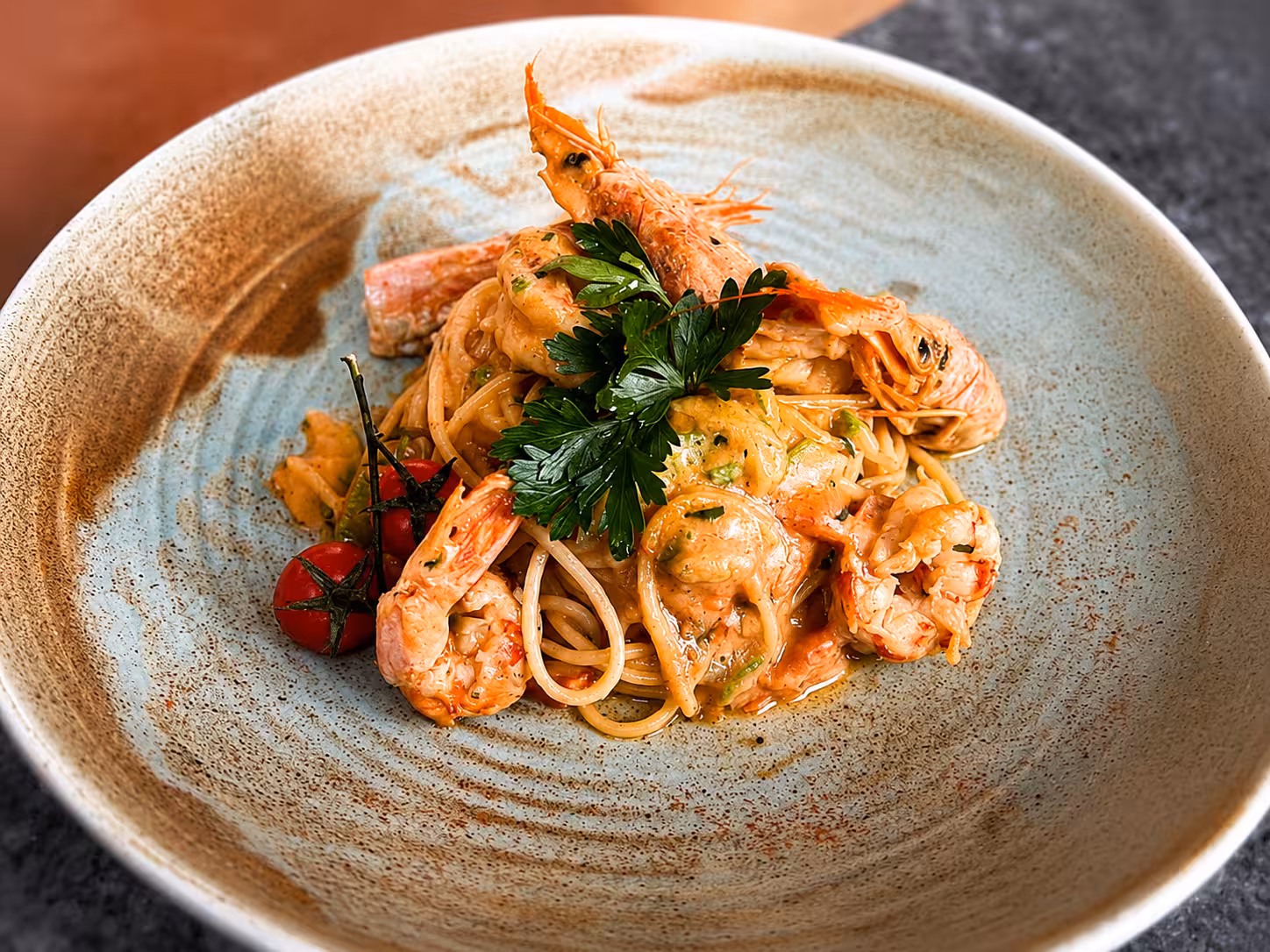 Creamy shrimp pasta with parsley garnish